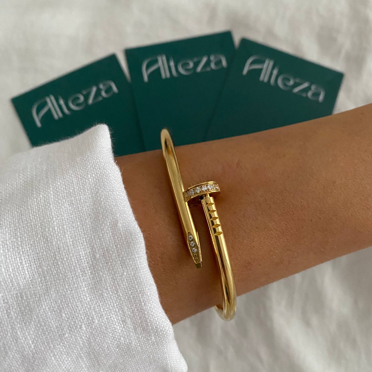 PULSERA CLAVO BRILLO