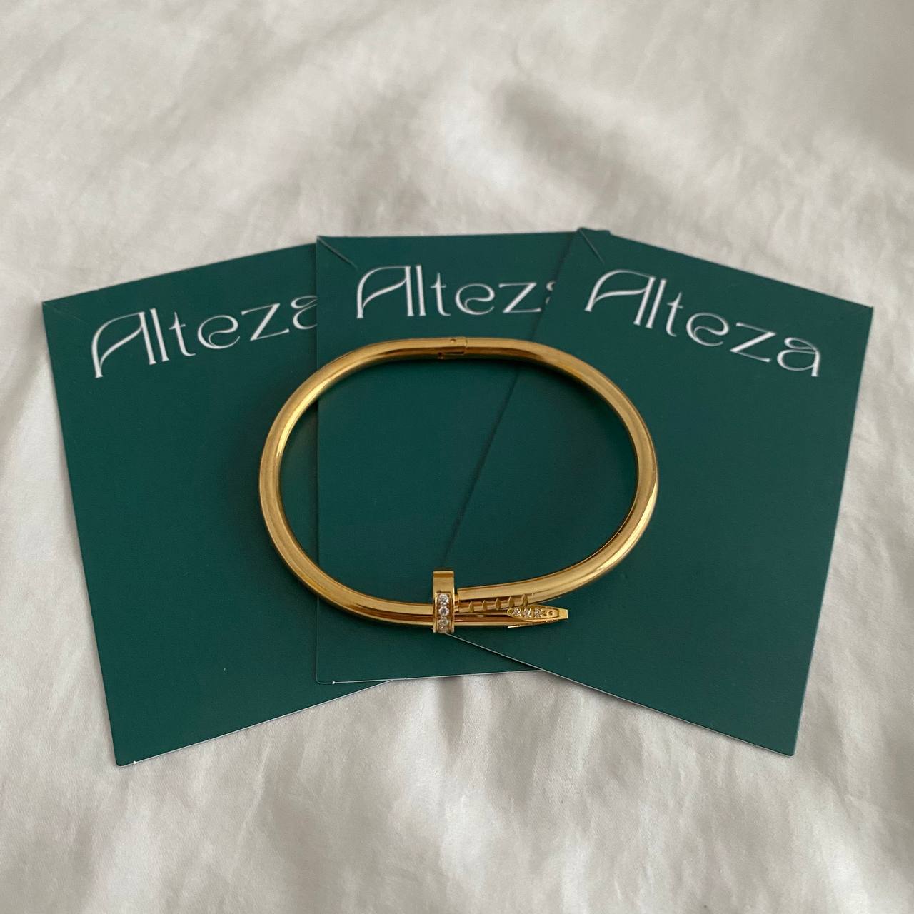 PULSERA CLAVO BRILLO